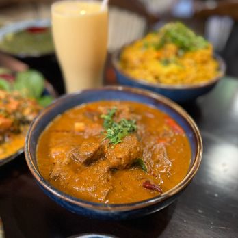 Keeva Indian Kitchen signature dishes Lamb Rogan JoshChicken Tikka MasalaSaag Paneer
